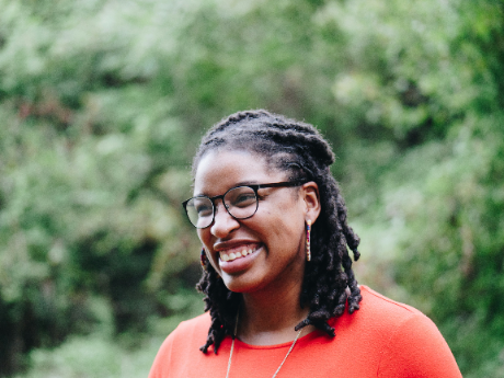 Smiling woman representing trust and positive experience with our services