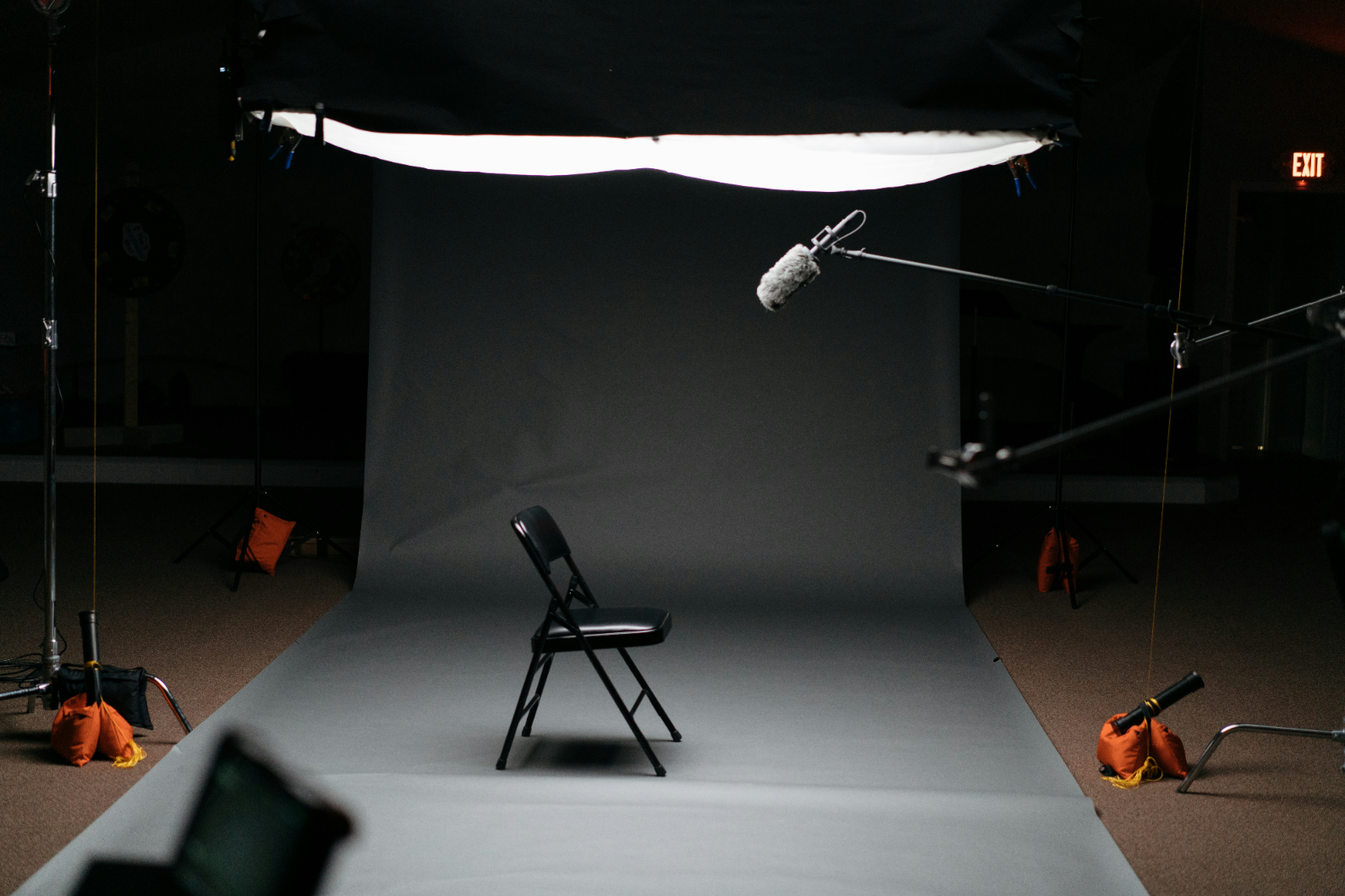keagan-henman-pPxJTtxfV1A-unsplash Empty interview setup representing preparation for in-depth interviews