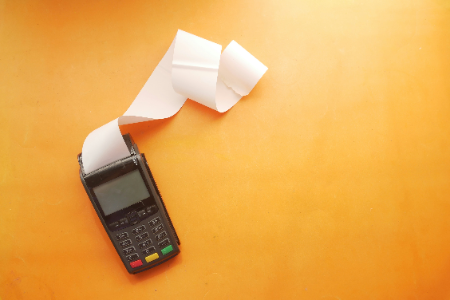 Billing machine at a retail store representing value-added retail audit services